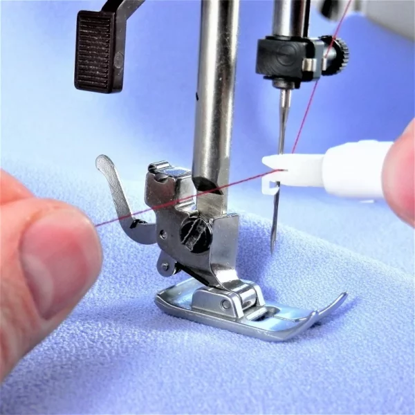 Enhebrador de máquinas de coser